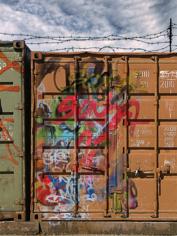 Graffiti Shipping Container Photography Backdrop - Urban graffiti on a rusted shipping container, ideal as a photography backdrop for edgy, street-themed photoshoots.