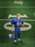 Studio backdrop simulating a football field with detailed yard markings.