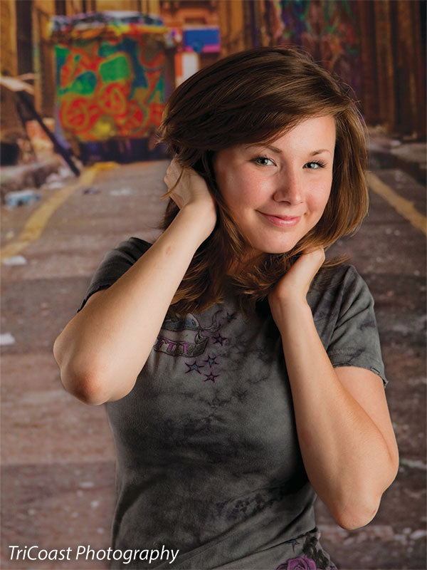 Backdrop featuring cracked pavement, alley markings, and inner-city details.