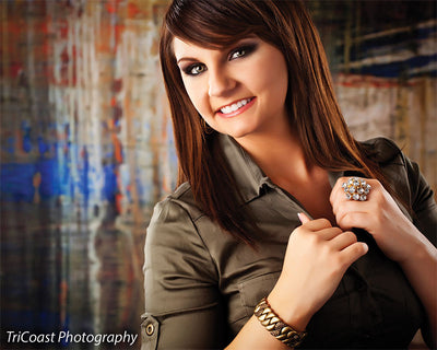 Backdrop evoking a distressed artist canvas.