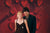 Valentine’s-inspired red backdrop with dimensional heart design.