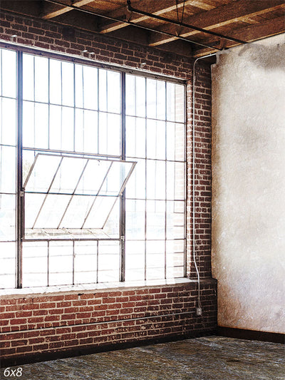 Industrial Loft Photography Backdrop - Industrial loft photography backdrop featuring exposed brick walls, large windows, and wooden beams.