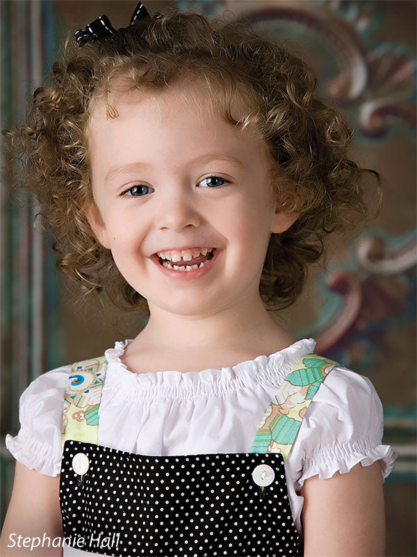 Backdrop with metallic textures and embossed pattern for studio portraits.