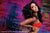 Energetic backdrop featuring dynamic multicolor brushwork and high-contrast tones.