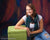 Kinetic motion effect backdrop with rich color transitions and dark framing.