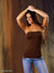 Backdrop with maple-colored streaks and smooth painterly transitions.