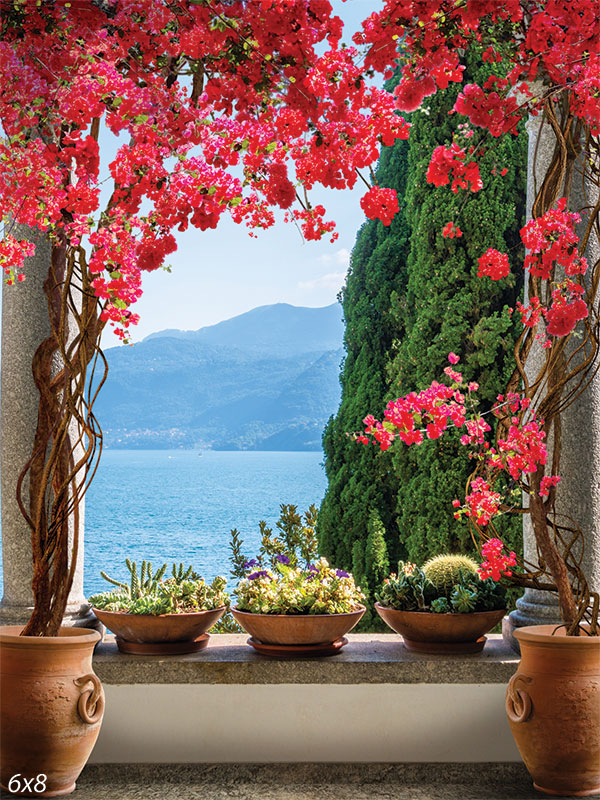 Mediterranean Garden Photography Backdrop - A Mediterranean garden terrace with red bougainvillea, lush greenery, and a view of the sea, ideal as a photography backdrop.