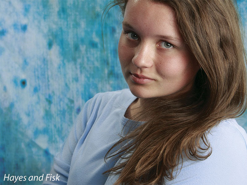 Painterly backdrop with weathered color flow and aged detail for portrait work.
