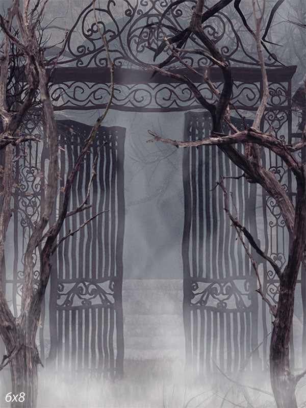 Mystic Iron Gate Photography Backdrop - A mystical photography backdrop featuring an ornate iron gate surrounded by twisted trees and shrouded in fog.