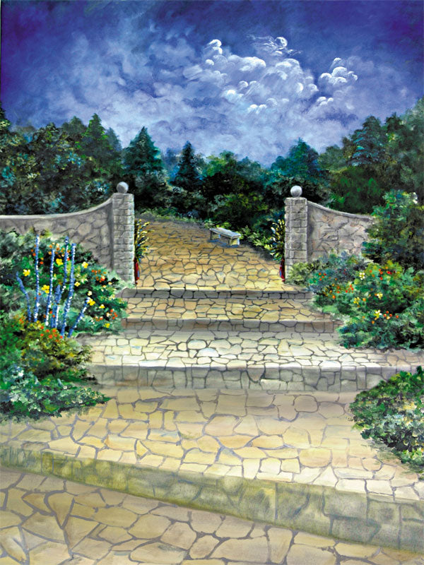 A romantic photography backdrop featuring a stone pathway leading into a lush, moonlit garden with deep blue skies and cloud details.