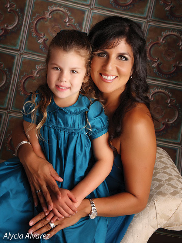 Backdrop evoking antique copper surfaces with oxidized finish.