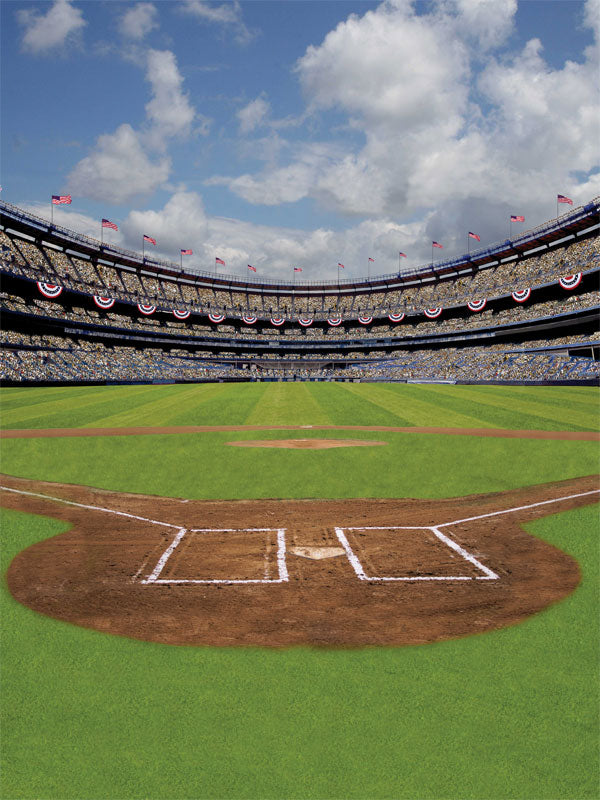 Baseball stadium scene from home plate with green grass and crowd-filled stands.
