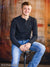 Backdrop with visual warmth in heavy brush patterns.