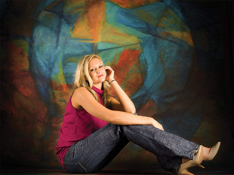 Expressive blend of warm and cool colors in an abstract, layered format.