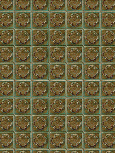 Backdrop featuring distressed copper tiles with greenish patina highlights.