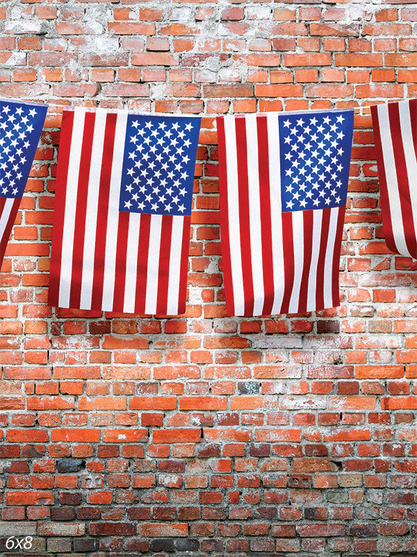 Patriotic American Flag Photography Backdrop - American flags hanging against a red brick wall backdrop, perfect for patriotic-themed photoshoots and celebrations.