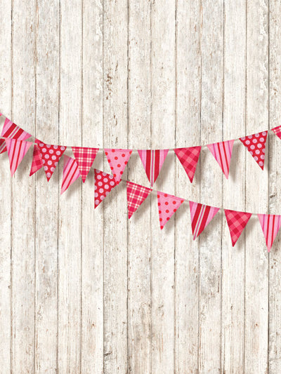 Pink Party Bunting and Wooden Wall Photography Backdrop - Festive pink and red bunting strung across a rustic whitewashed wooden plank backdrop, perfect for party-themed photoshoots.