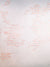 Distressed plaster with scattered red brick patches for a soft urban texture and vintage wall effect.