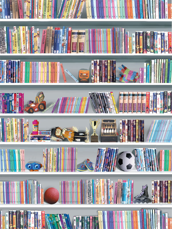 A vibrant bookshelf photography backdrop featuring colorful books, playful toys, and school-themed decorations, perfect for children's portraits.