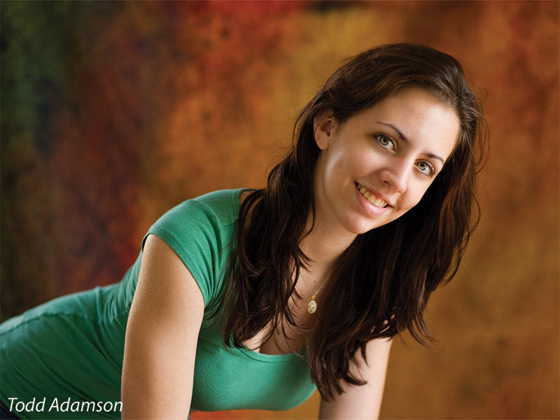 Abstract blend of earthy colors with a soft glowing center and aged character.