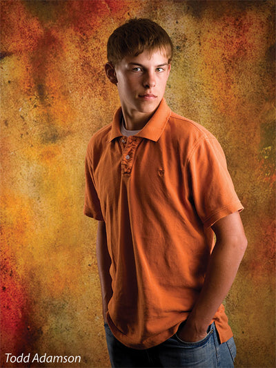 Earthy vignette backdrop with distressed textures and fiery tones.