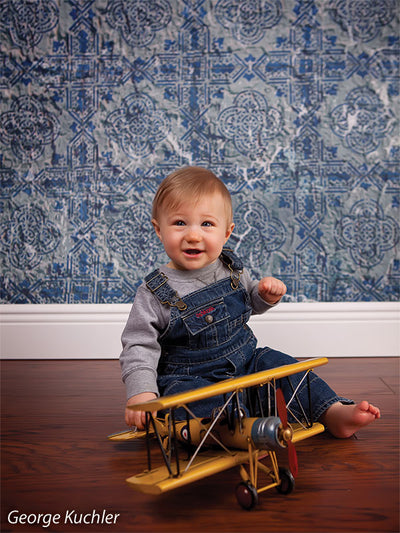 Studio backdrop featuring classic Portuguese azulejos tile design.