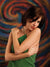 Blended strokes of saturated hues forming a circular visual flow.