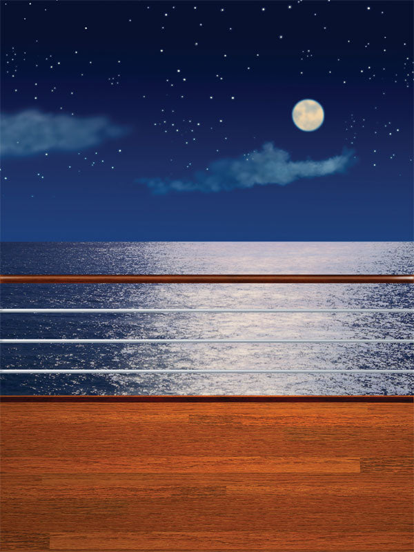 A photography backdrop featuring a moonlit ocean, shimmering water reflections, a starlit sky, and a wooden deck with a sleek railing.