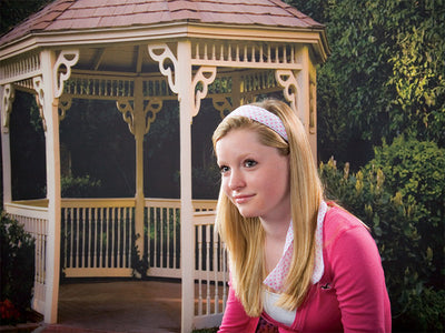 Charming gazebo nestled in manicured park greenery—ideal for couples and events.