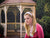Charming gazebo nestled in manicured park greenery—ideal for couples and events.