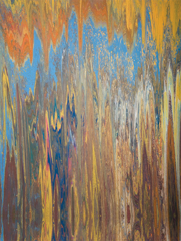 Abstract backdrop with vertical streaks in gold, blue, and rust mimicking water motion.