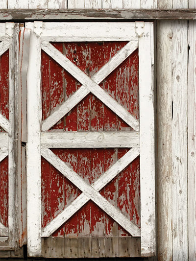 Rustic Barn Door Photography Backdrop - Rustic red barn door photography backdrop with white crossbeam structure, perfect for vintage and country-themed photoshoots.