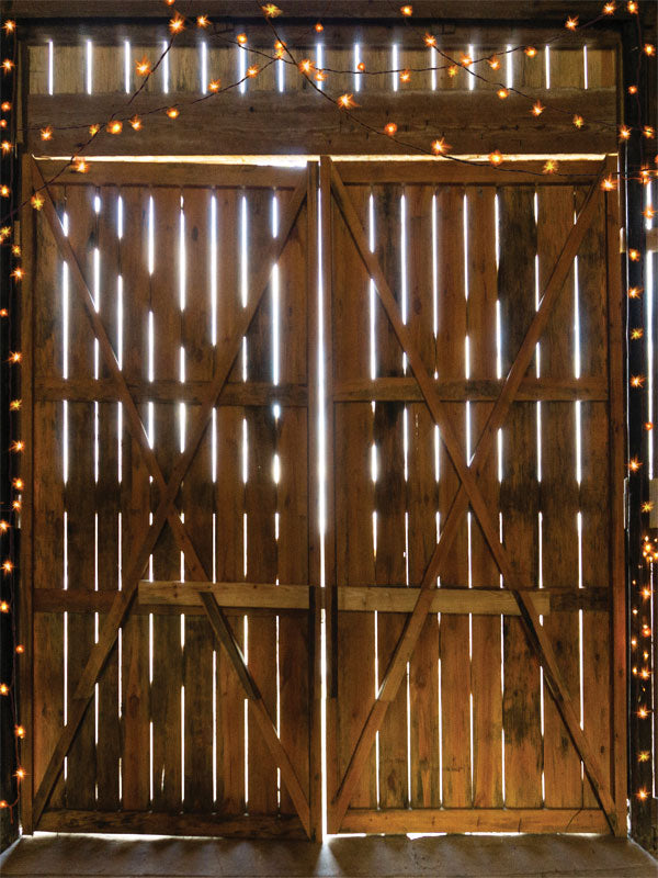 Rustic Barn Doors with String Lights Photography Backdrop - Rustic barn door photography backdrop with glowing string lights, ideal for warm and cozy photoshoots.