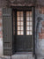 Rustic Brown Door Photography Backdrop - Rustic brown door photography backdrop with distressed wood and brick textures for vintage-themed photoshoots.