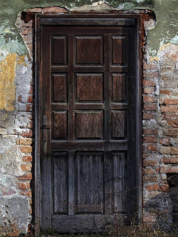 Rustic Door and Brick Wall Photography Backdrop - A rustic wooden door set against a weathered brick wall backdrop, ideal for vintage or urban-themed photoshoots.