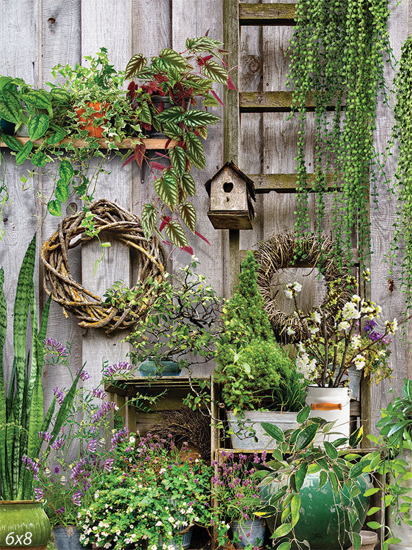 Rustic Garden Wall Photography Backdrop - Rustic garden wall photography backdrop with wooden wall, lush greenery, and charming garden decorations.