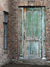 Rustic Green Door Photography Backdrop - Rustic green door photography backdrop with distressed wooden door and brick wall, ideal for vintage and outdoor-themed photoshoots.