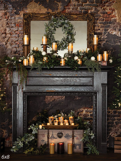 Rustic Holiday Fireplace Photography Backdrop - A rustic holiday fireplace photography backdrop featuring a dark wood mantle, candles, greenery, and a brick wall setting.