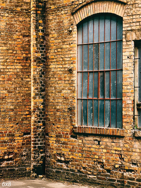 Rustic Industrial Brick Wall Photography Backdrop - Photography backdrop featuring a weathered brick wall with a vintage arched window.