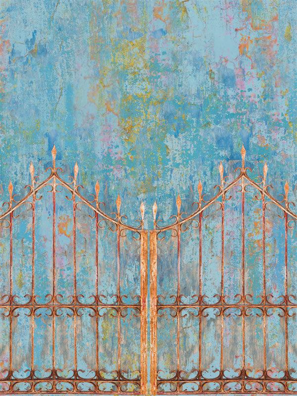 Rustic Iron Gate Photography Backdrop - Photography backdrop featuring a rustic iron gate with detailed scrollwork against a weathered, textured background.