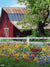 Rustic Red Barn with Flower Garden Backdrop - Photography backdrop of a rustic red barn with a vibrant flower garden in the foreground.