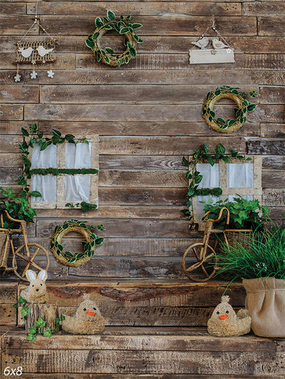 Rustic Springtime Decor Photography Backdrop - Rustic springtime decor photography backdrop with wooden wall, greenery wreaths, and playful straw animals.