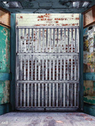 Rustic Urban Industrial Gate Photography Backdrop - Rustic urban industrial gate photography backdrop with worn metal and weathered brick wall.