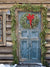 Rustic Winter Door with Evergreen Wreath Photography Backdrop - Festive winter door backdrop with evergreen wreath and garland, ideal for professional photography.