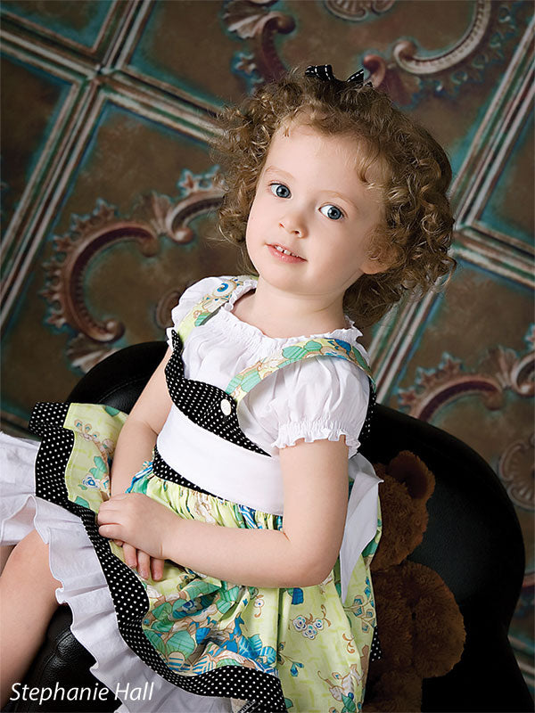 Aged copper square tile backdrop ideal for vintage-themed photography.