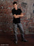 Rustic red brick photography backdrop with weathered stucco accents.