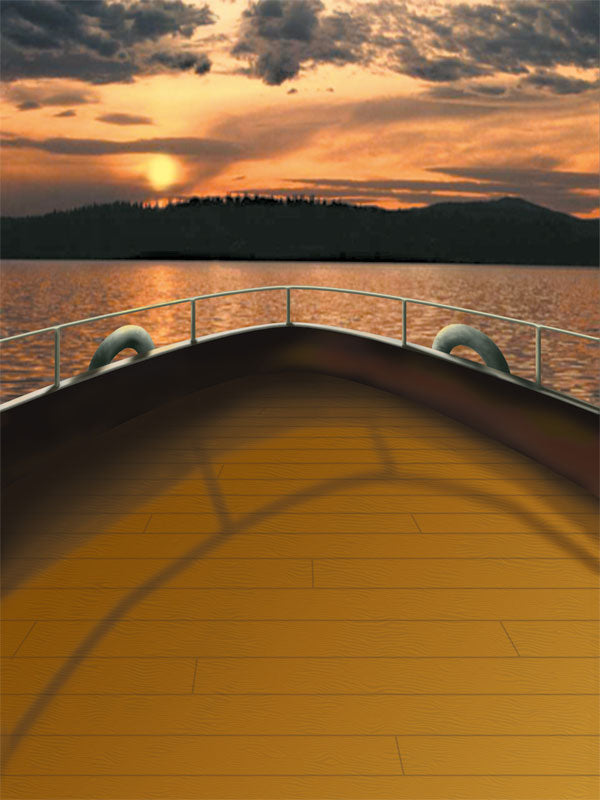 A nautical photography backdrop featuring a ship's bow overlooking a peaceful sunset over the water.