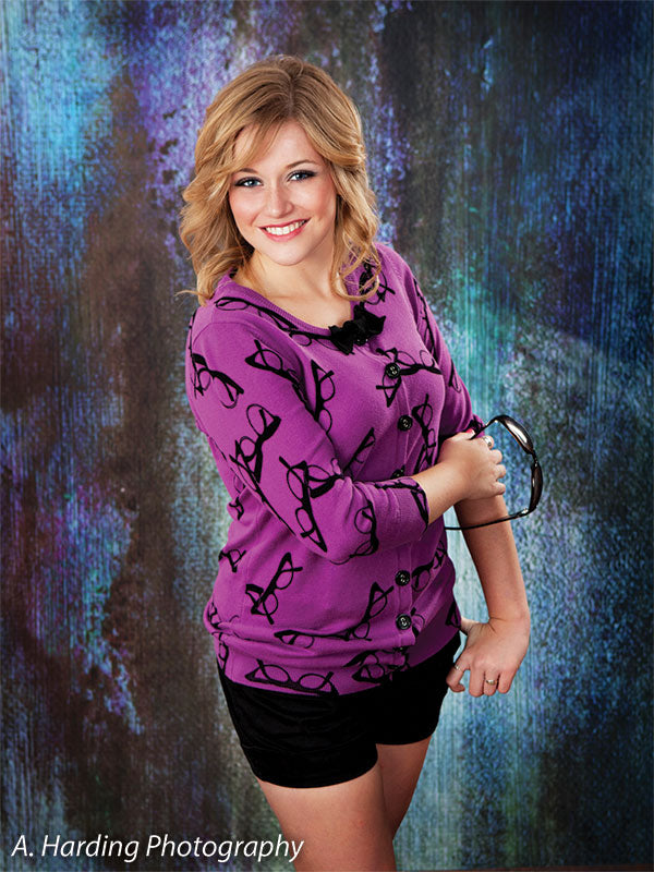 Backdrop inspired by flowing water and diffused cool lighting.