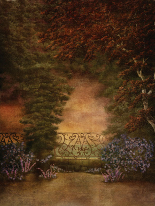 Vintage garden-themed backdrop featuring wrought iron railing, soft sunset lighting, floral accents, and rich tree foliage—ideal for classic portraits, dance, and formal children’s photography.