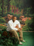 Scenic park setting with palm trees, landscaped bushes, and vibrant natural tones.
